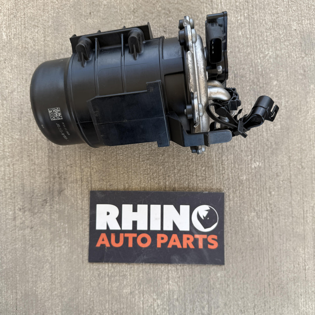 -
  
  Ford
  Ranger
  
  Fuel Filter Housing
  JB3G9155AD