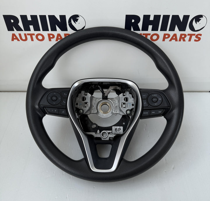 -
  
  Toyota
  Corolla
  Hybrid
  Steering Wheel